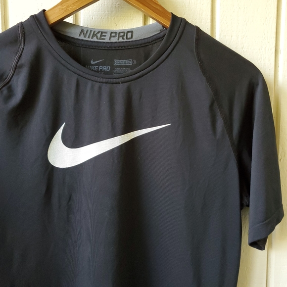 center swoosh nike shirt